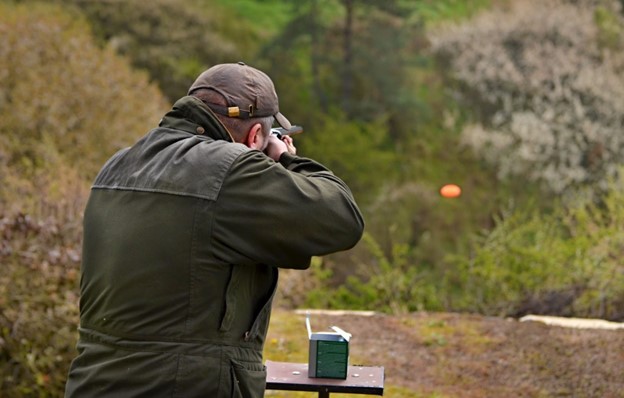 Person shooting clay